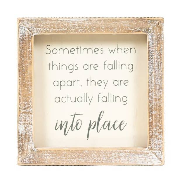 FALLING INTO PLACE SIGN