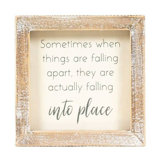FALLING INTO PLACE SIGN