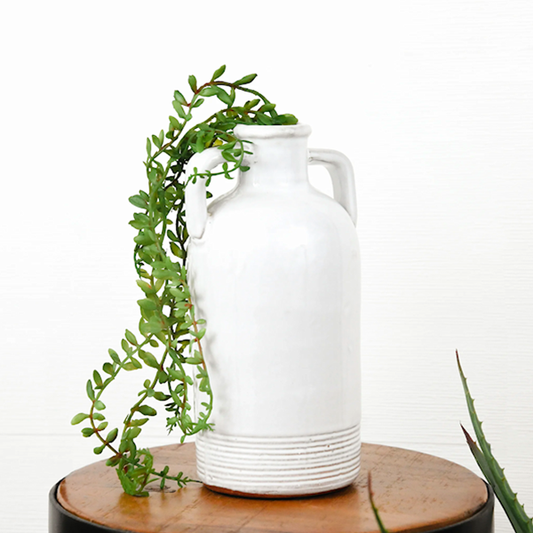 POTTERY W/ HANDLE JAR