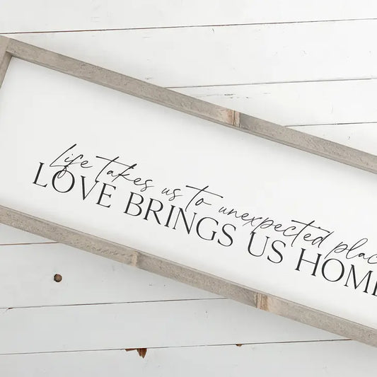 LOVE BRINGS US HOME WOOD SIGN