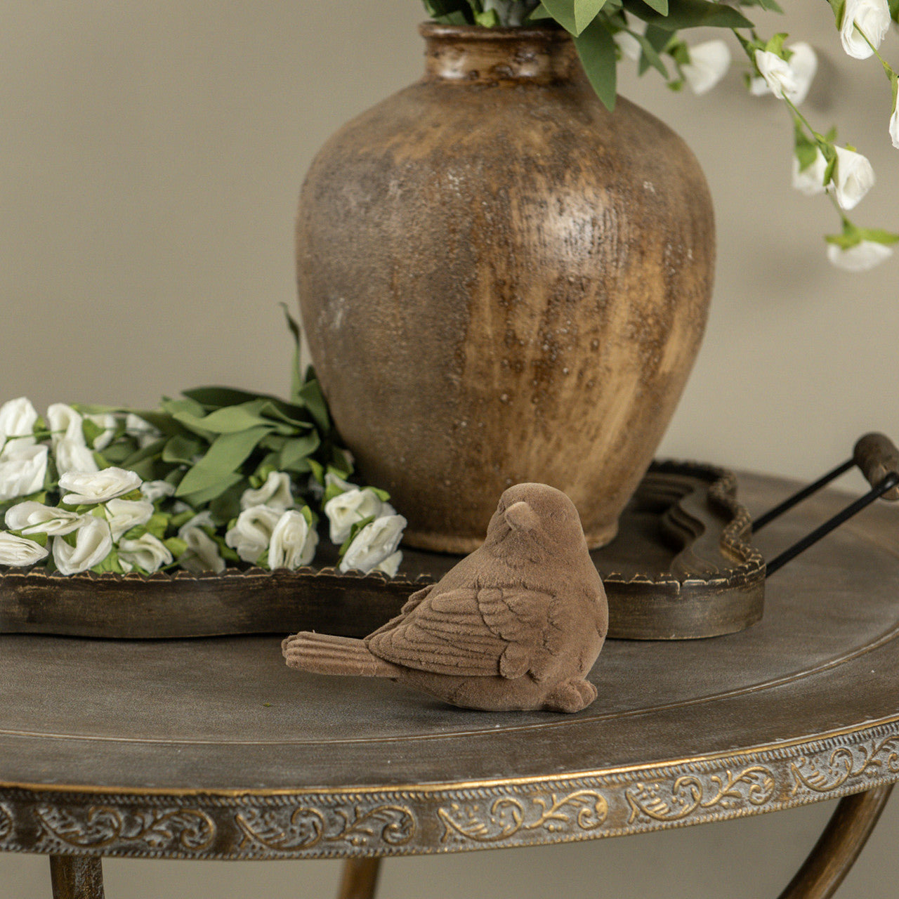 BROWN FLOCKED BIRD